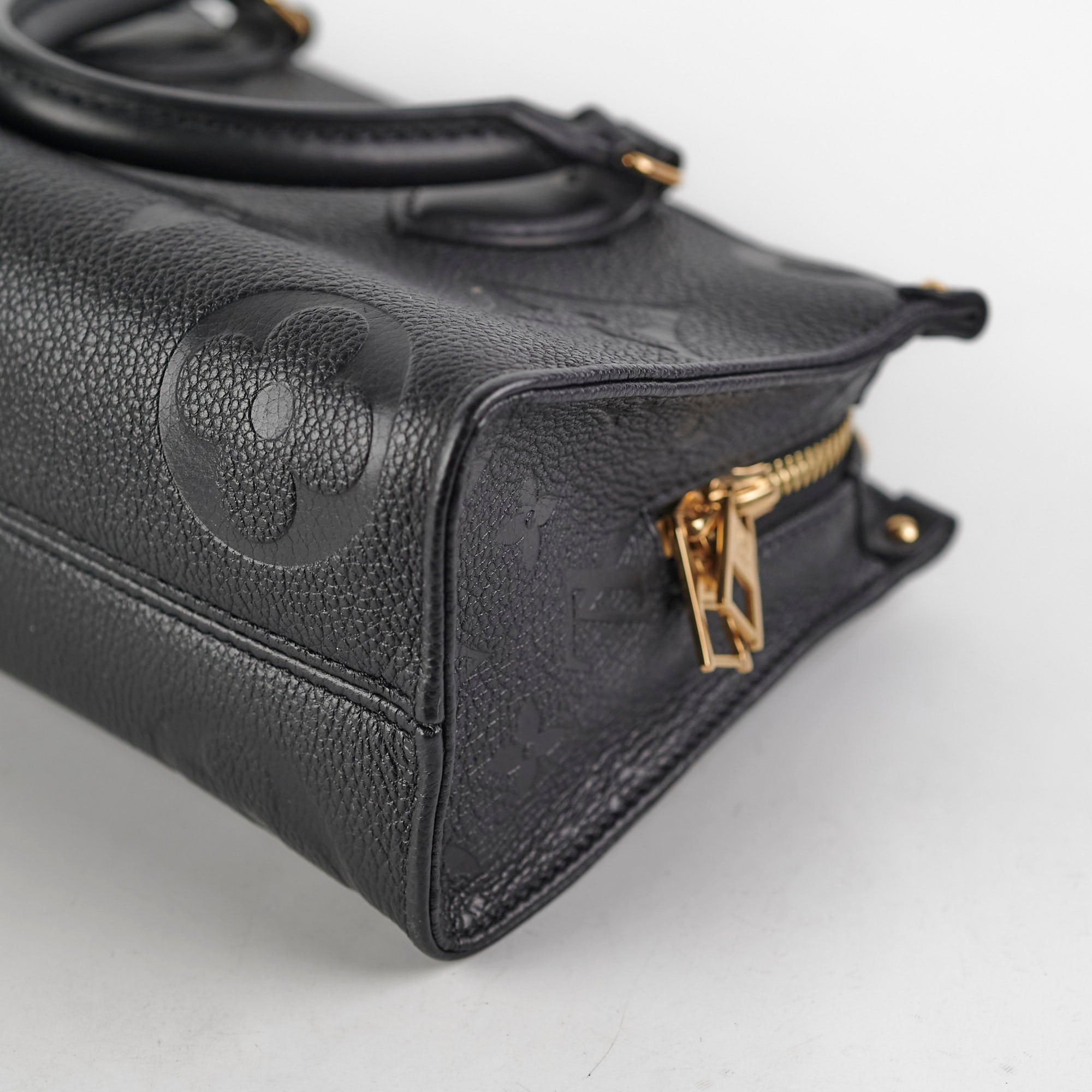 ITEM 31 - Louis Vuitton On The Go East West Empreinte Black