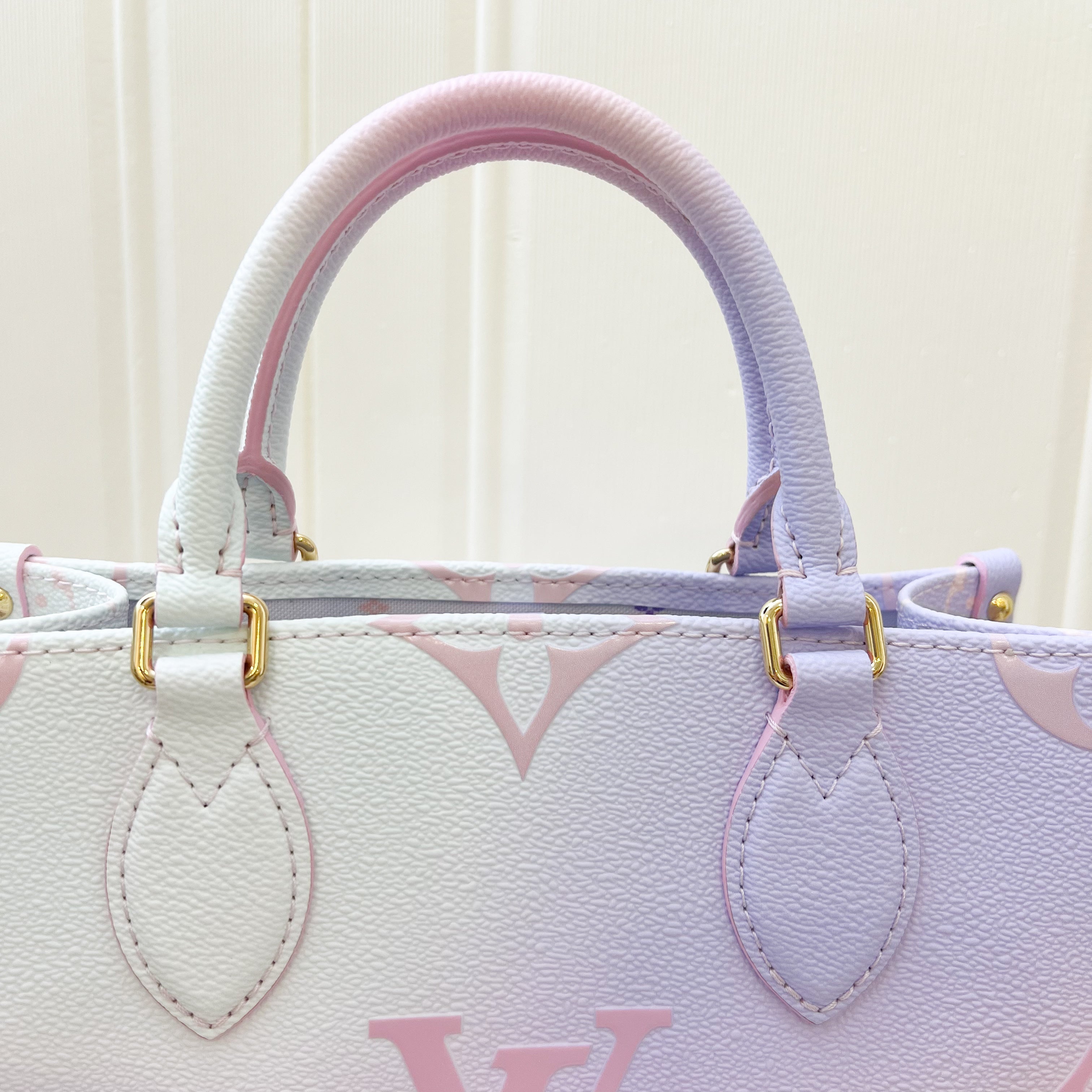 LV Onthego PM in Pastel Sunrise Monogram Empreinte Leather GHW