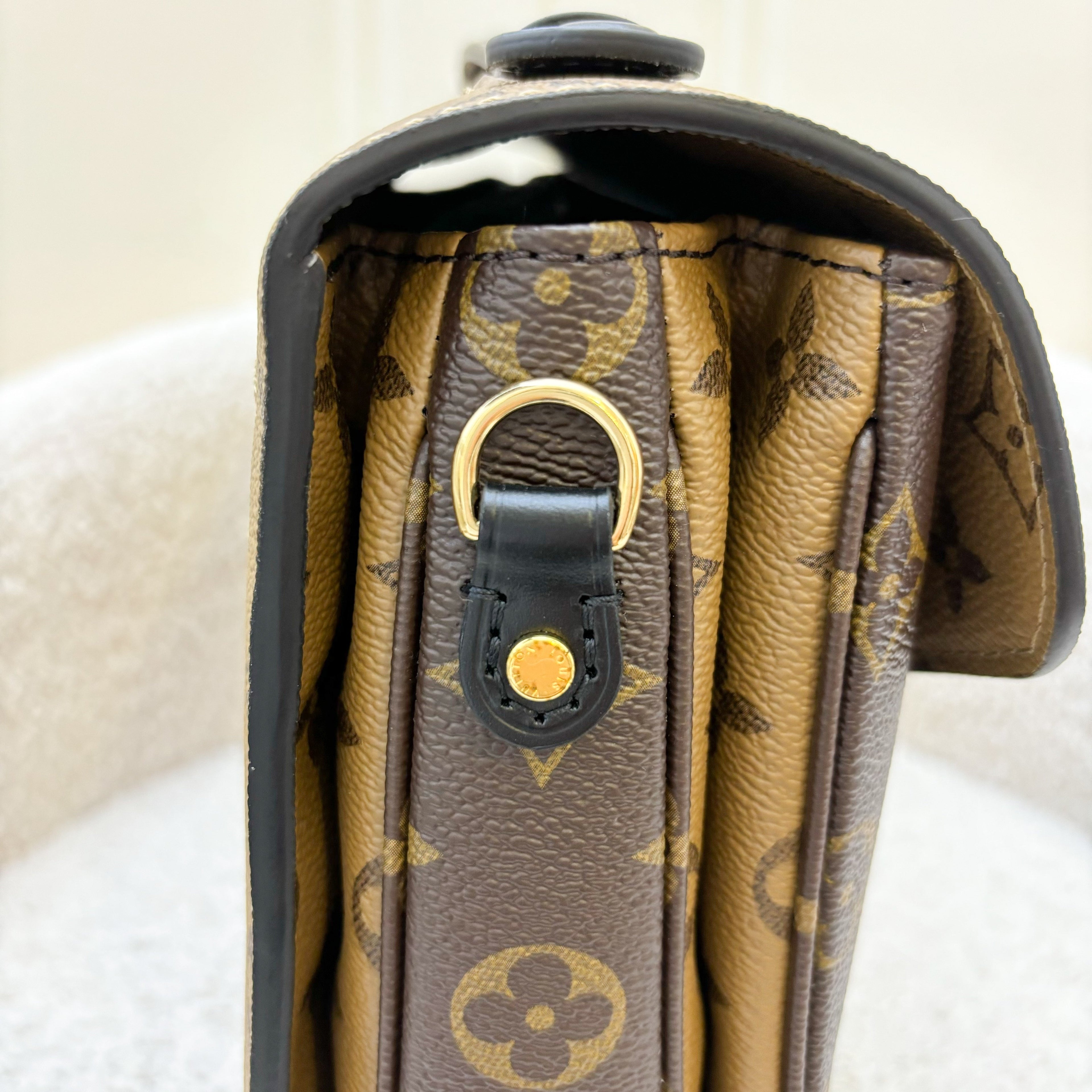 LV Pochette Metis in Reverse Monogram Canvas, Black Leather and GHW