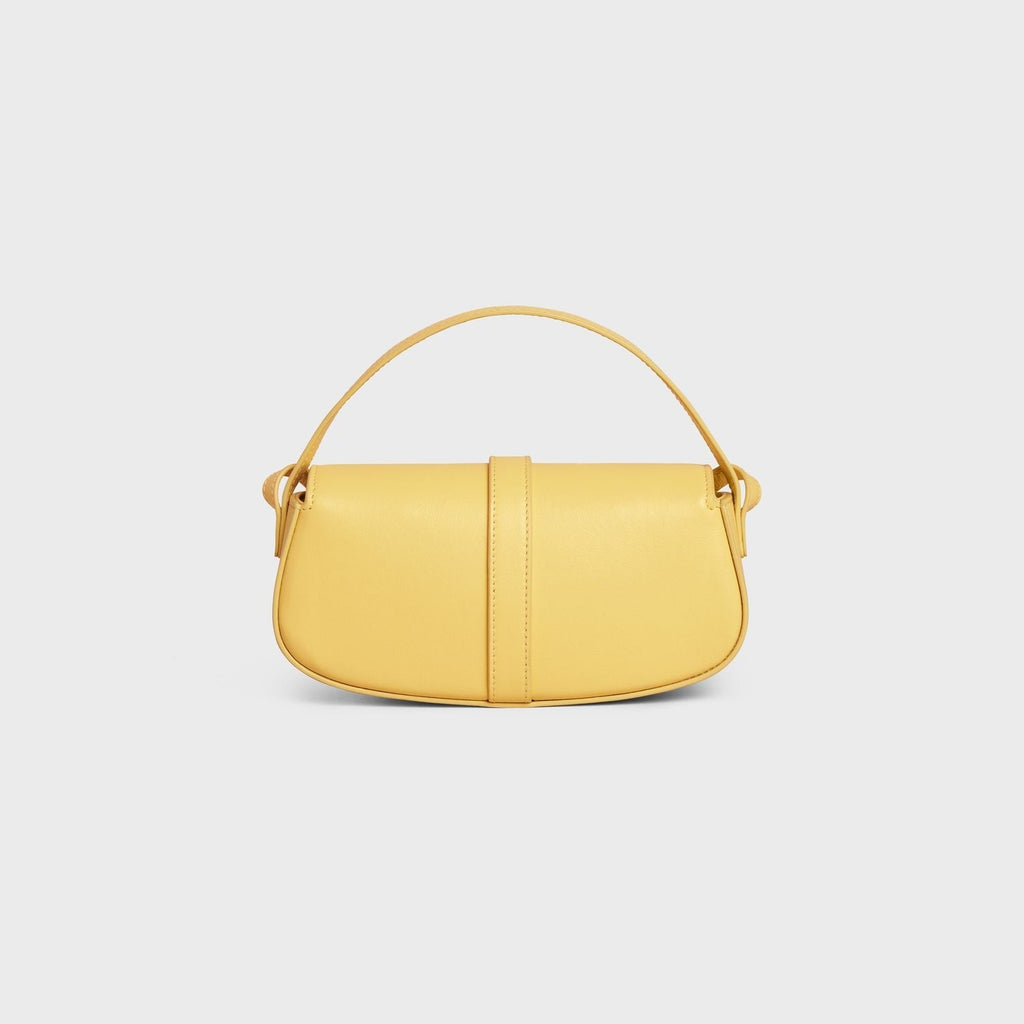 CLUTCH ON STRAP TABOU