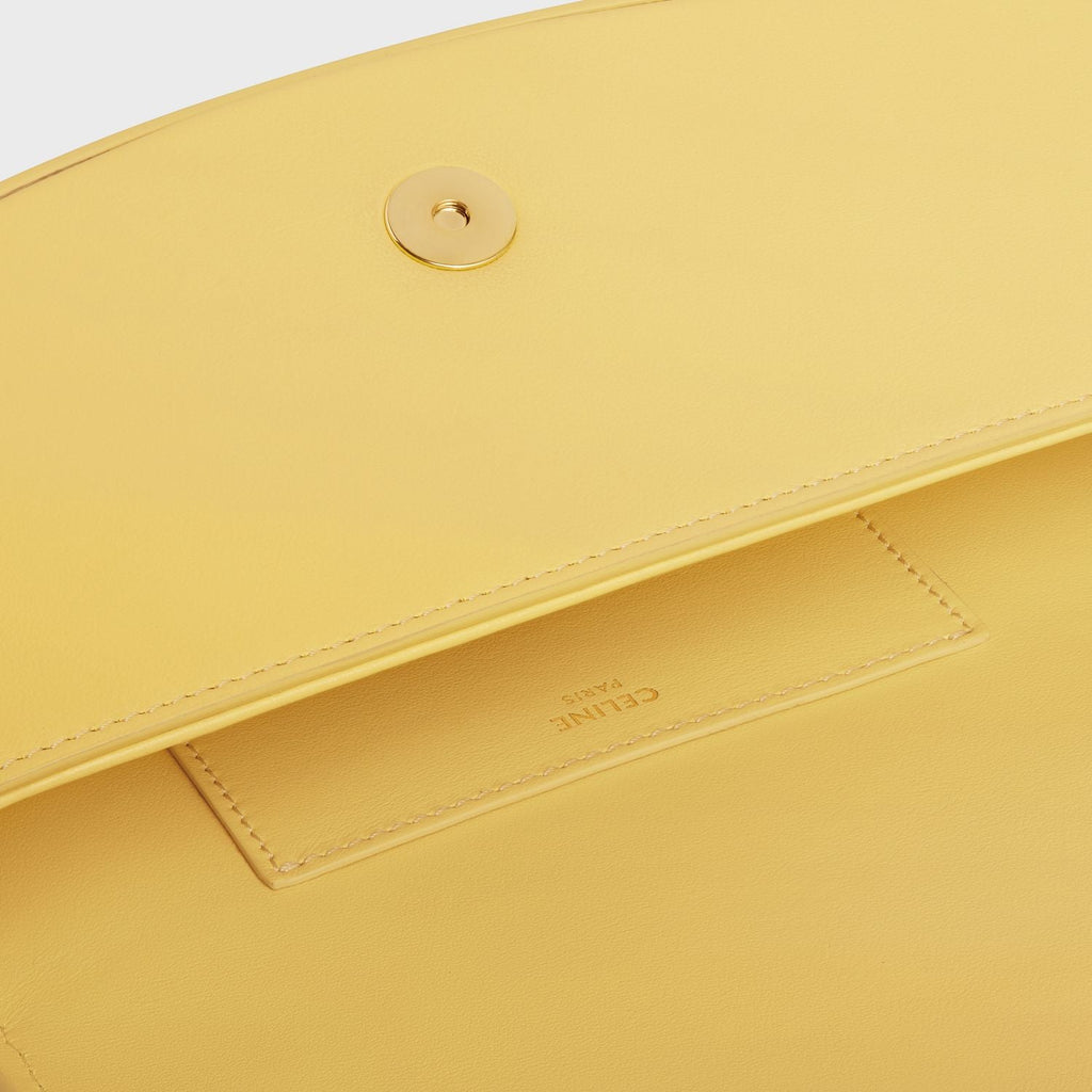 CLUTCH ON STRAP TABOU