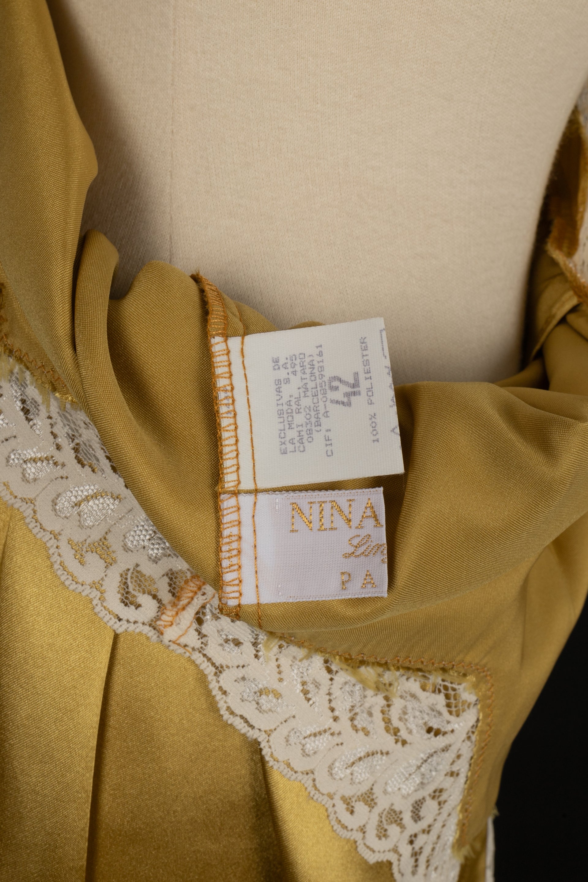 DÃƒÆ’Ã‚Â©shabillÃƒÆ’Ã‚Â© en satin  Nina Ricci
