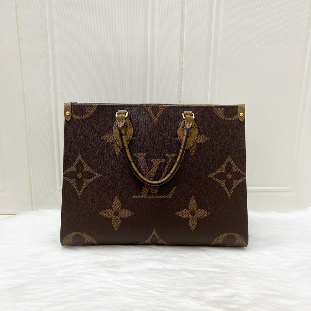 LV Onthego MM in Reverse Giant Monogram Canvas and GHW