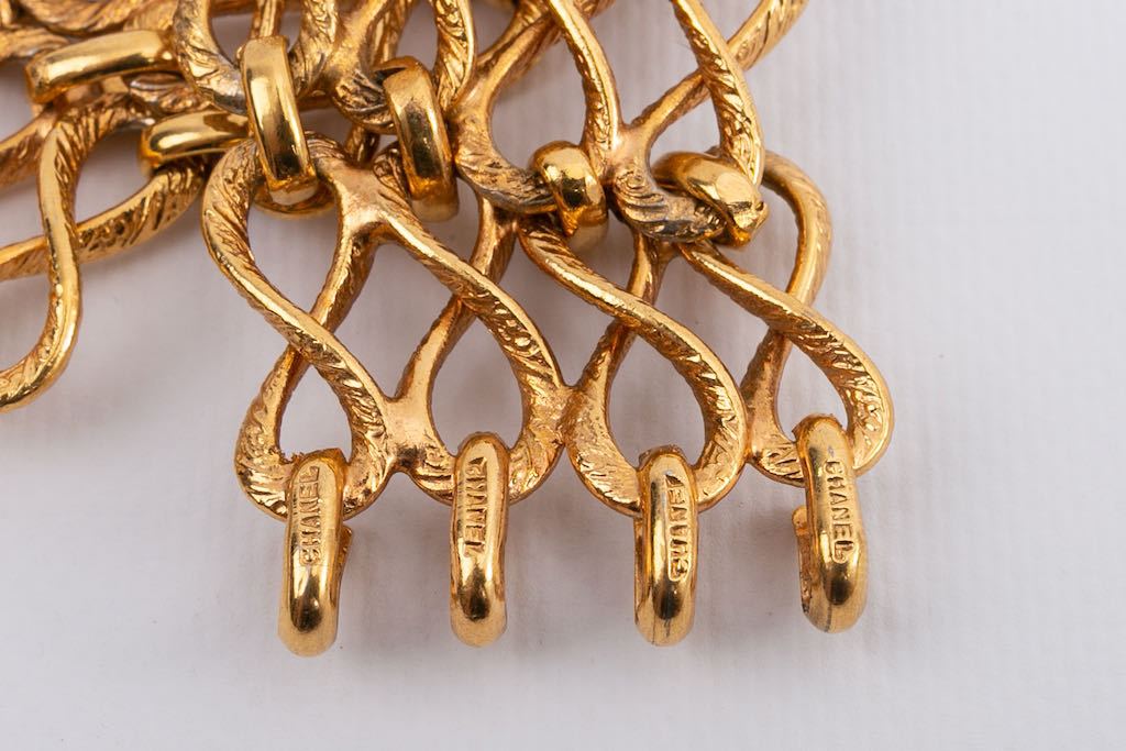 Bracelet articulÃƒÆ’Ã‚Â© en mÃƒÆ’Ã‚Â©tal dorÃƒÆ’Ã‚Â© Chanel
