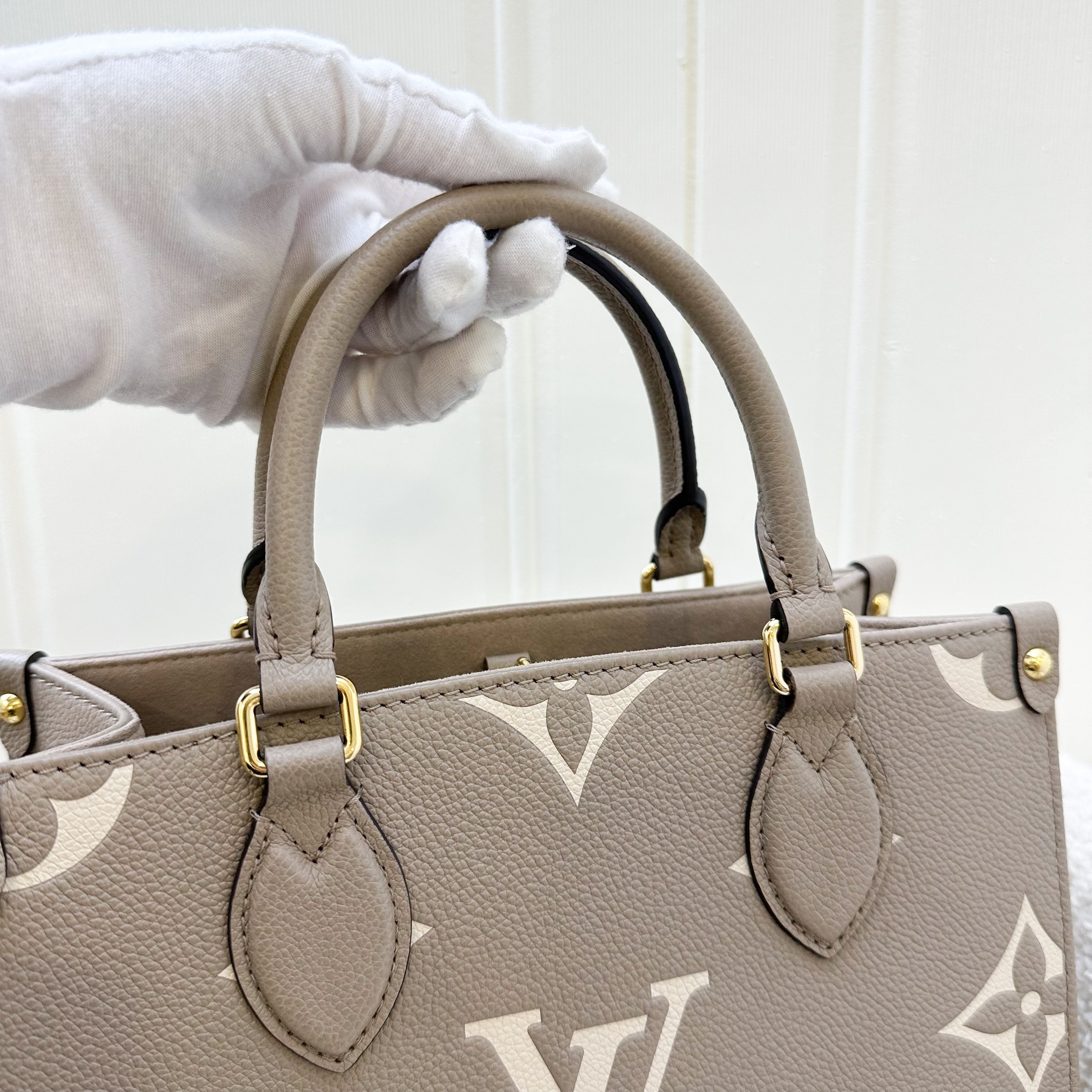 LV Onthego PM in Tourterelle (Grey) / Creme Giant Monogram Empreinte Leather and GHW