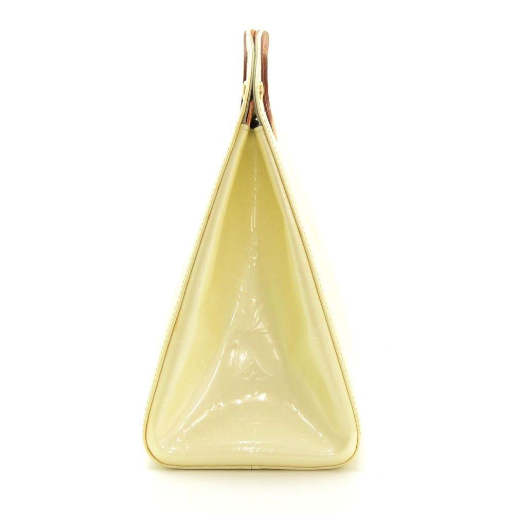 Louis Vuitto Maple Drive Handbag