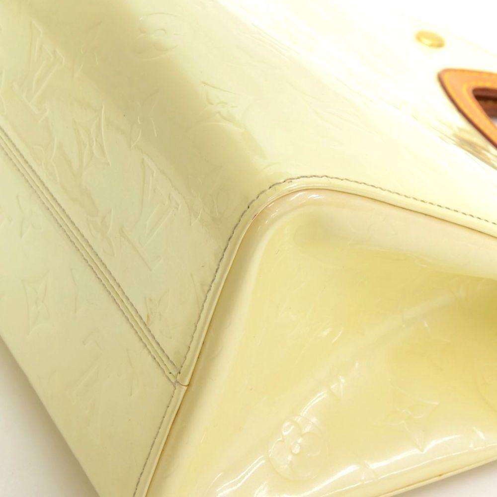 Louis Vuitto Maple Drive Handbag