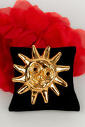 Broche soleil Christian Lacroix