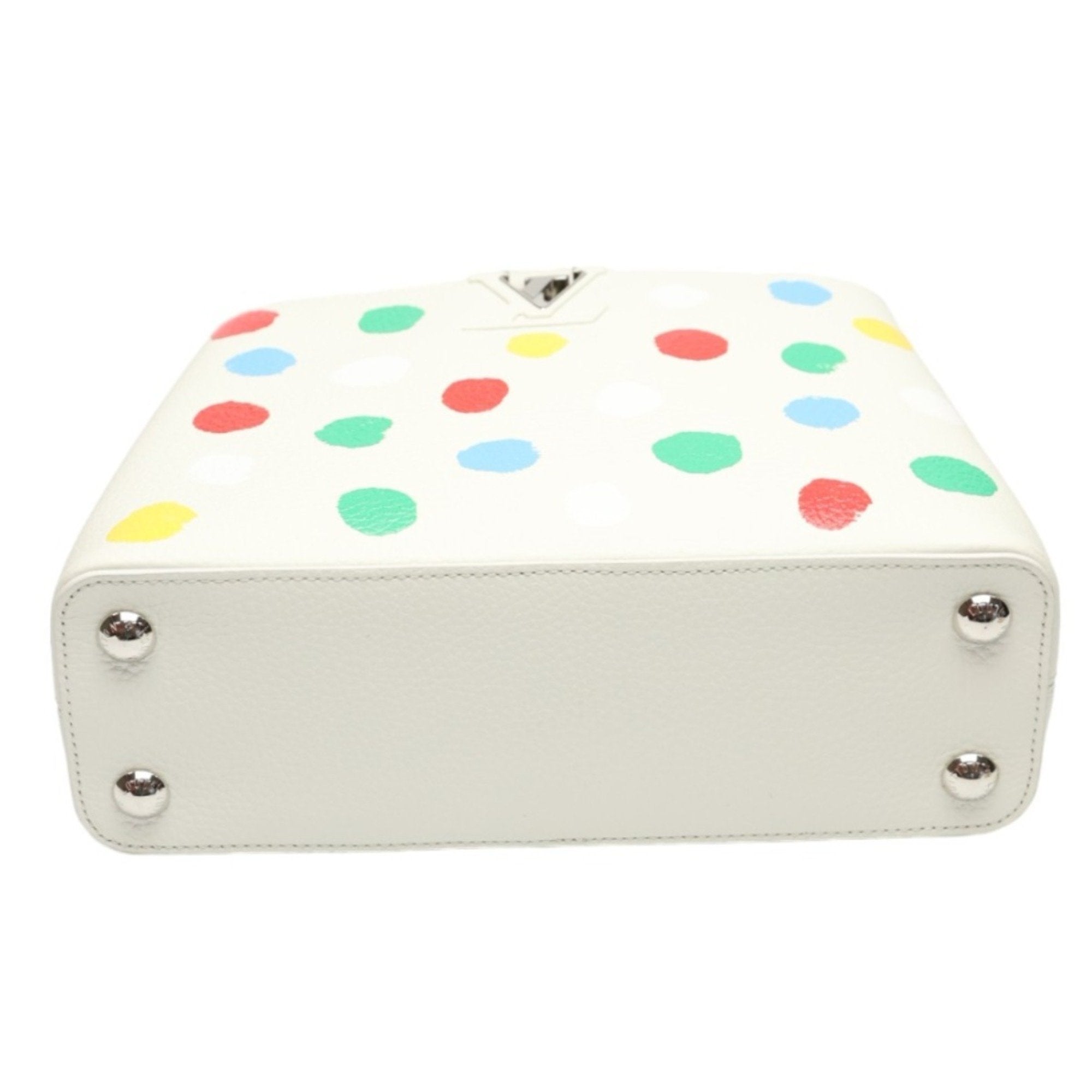 Luxurious White Leather Handbag with Yayoi Kusamas Signature Dot Pattern