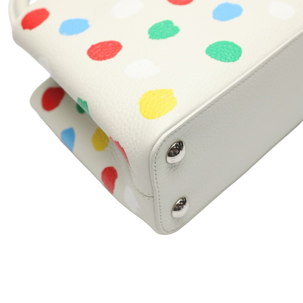 Luxurious White Leather Handbag with Yayoi Kusamas Signature Dot Pattern