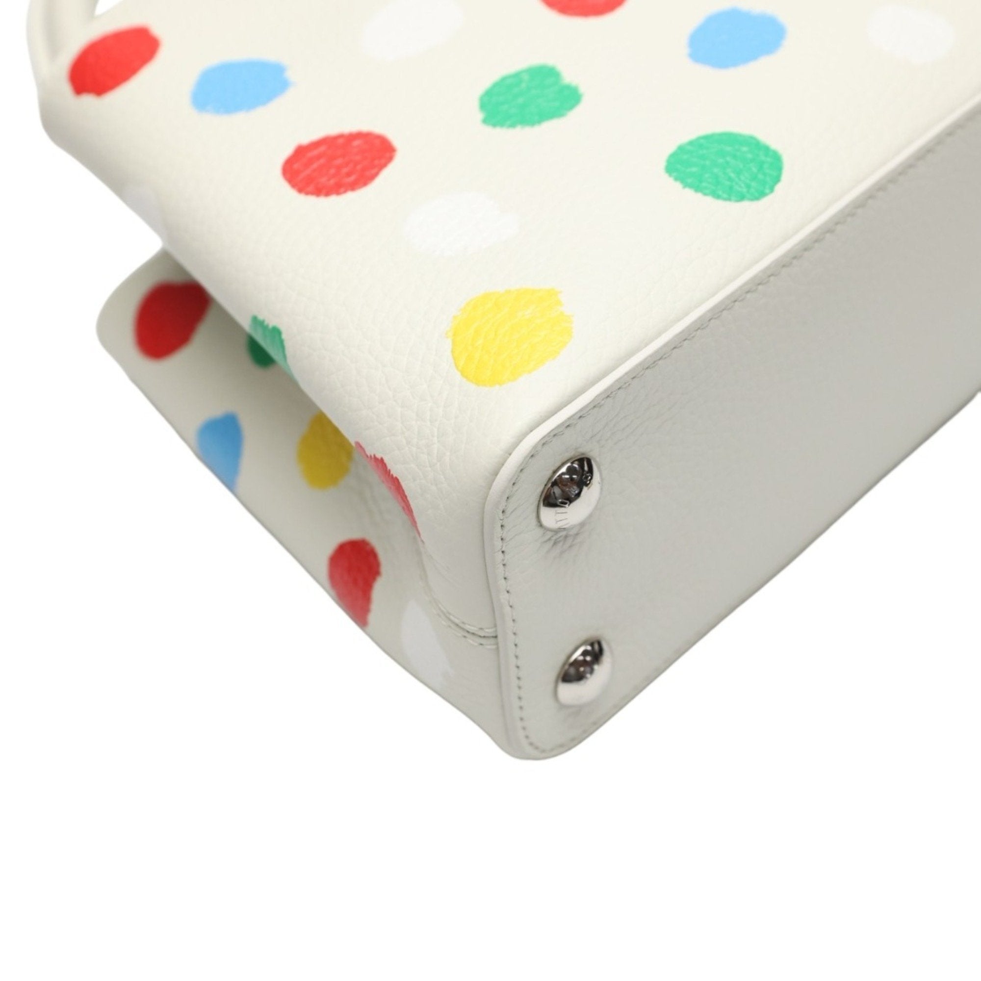 Luxurious White Leather Handbag with Yayoi Kusamas Signature Dot Pattern