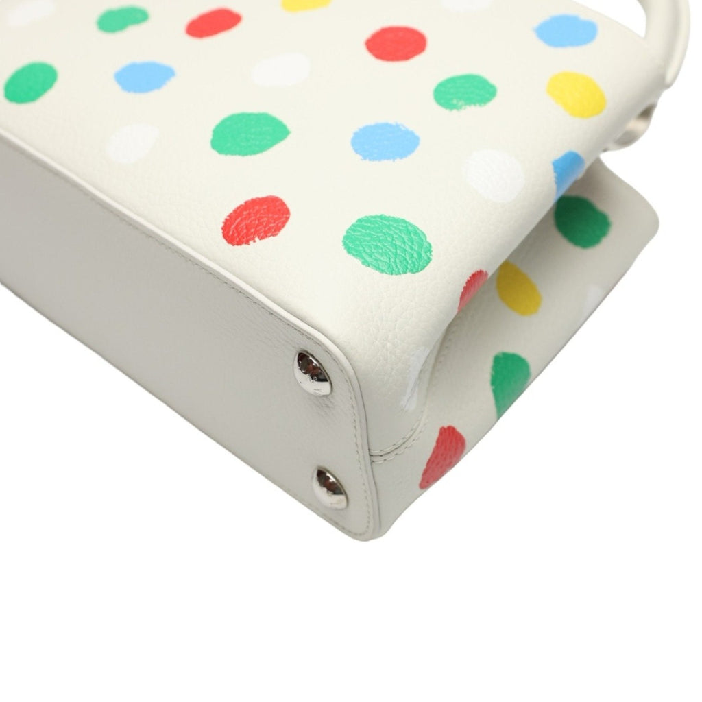 Luxurious White Leather Handbag with Yayoi Kusamas Signature Dot Pattern