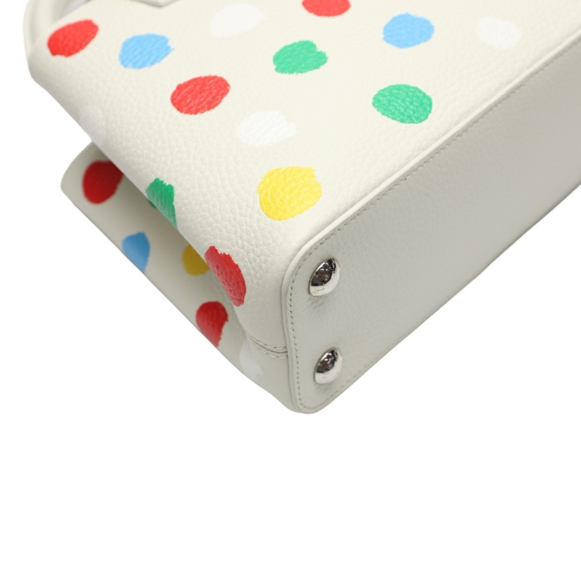 Luxurious White Leather Handbag with Yayoi Kusamas Signature Dot Pattern