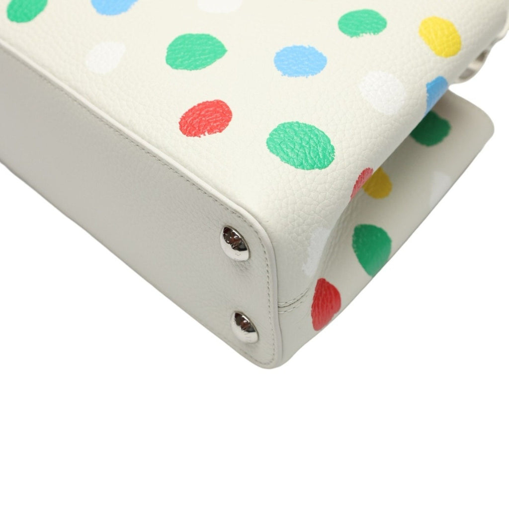 Luxurious White Leather Handbag with Yayoi Kusamas Signature Dot Pattern