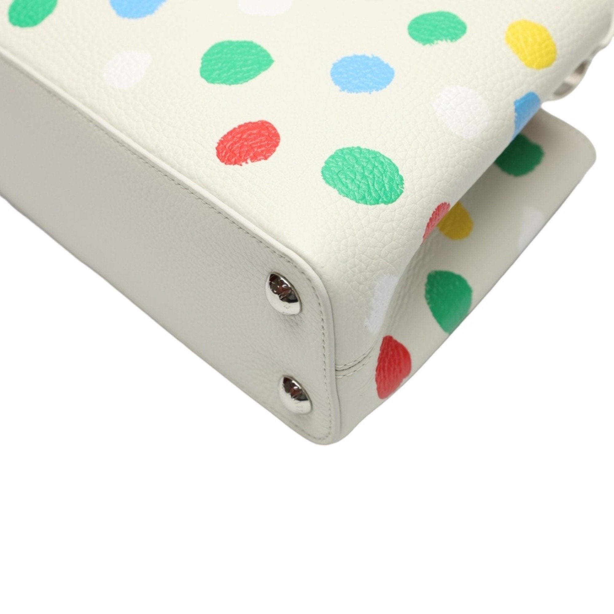 Luxurious White Leather Handbag with Yayoi Kusamas Signature Dot Pattern