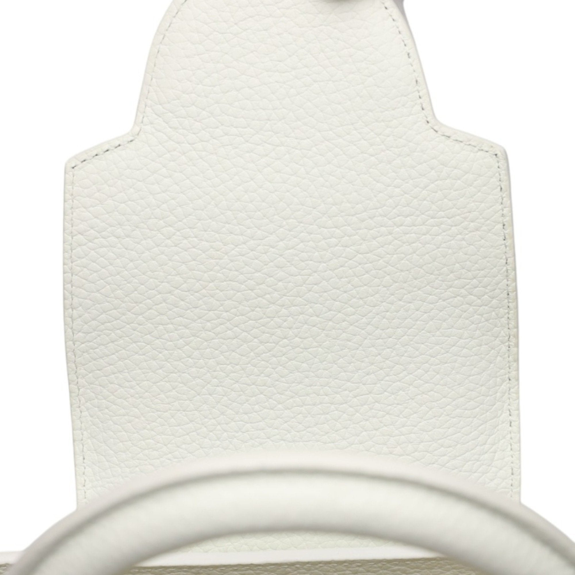 Luxurious White Leather Handbag with Yayoi Kusamas Signature Dot Pattern