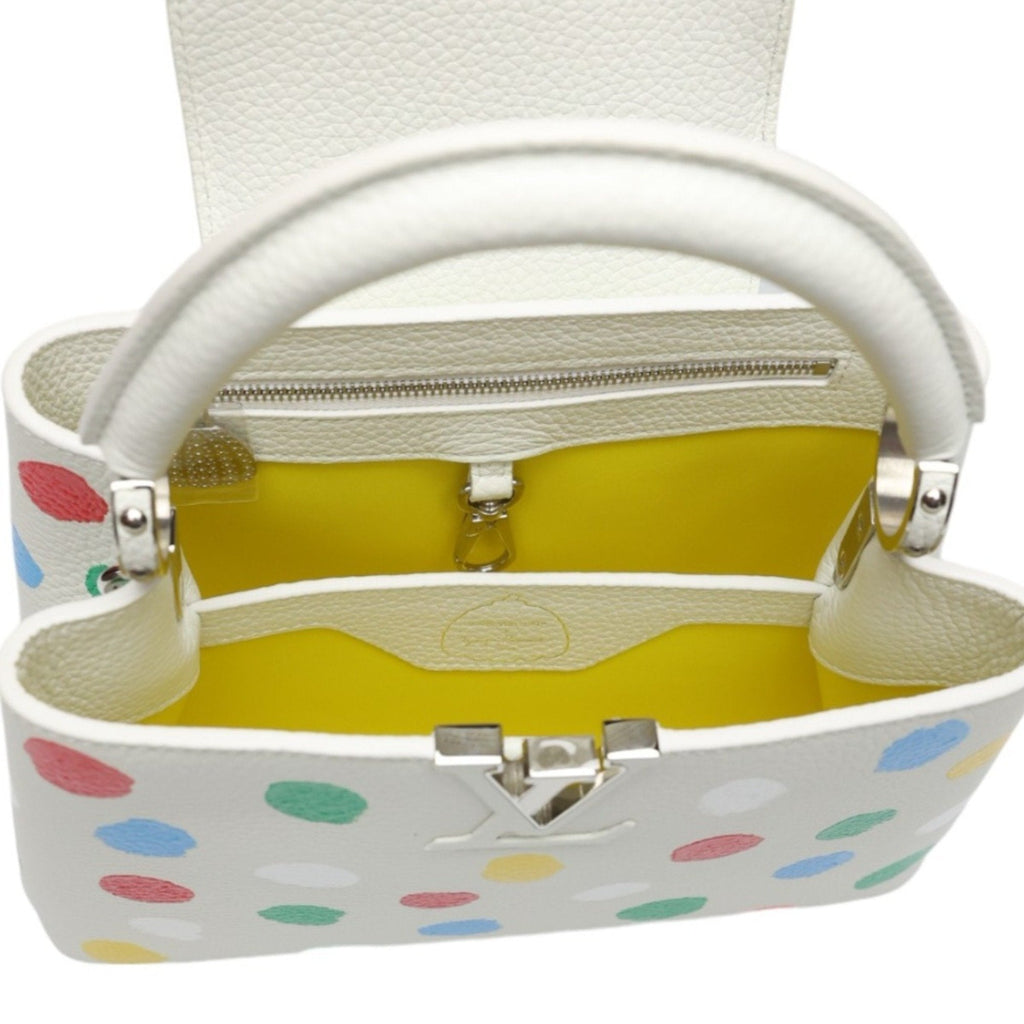 Luxurious White Leather Handbag with Yayoi Kusamas Signature Dot Pattern