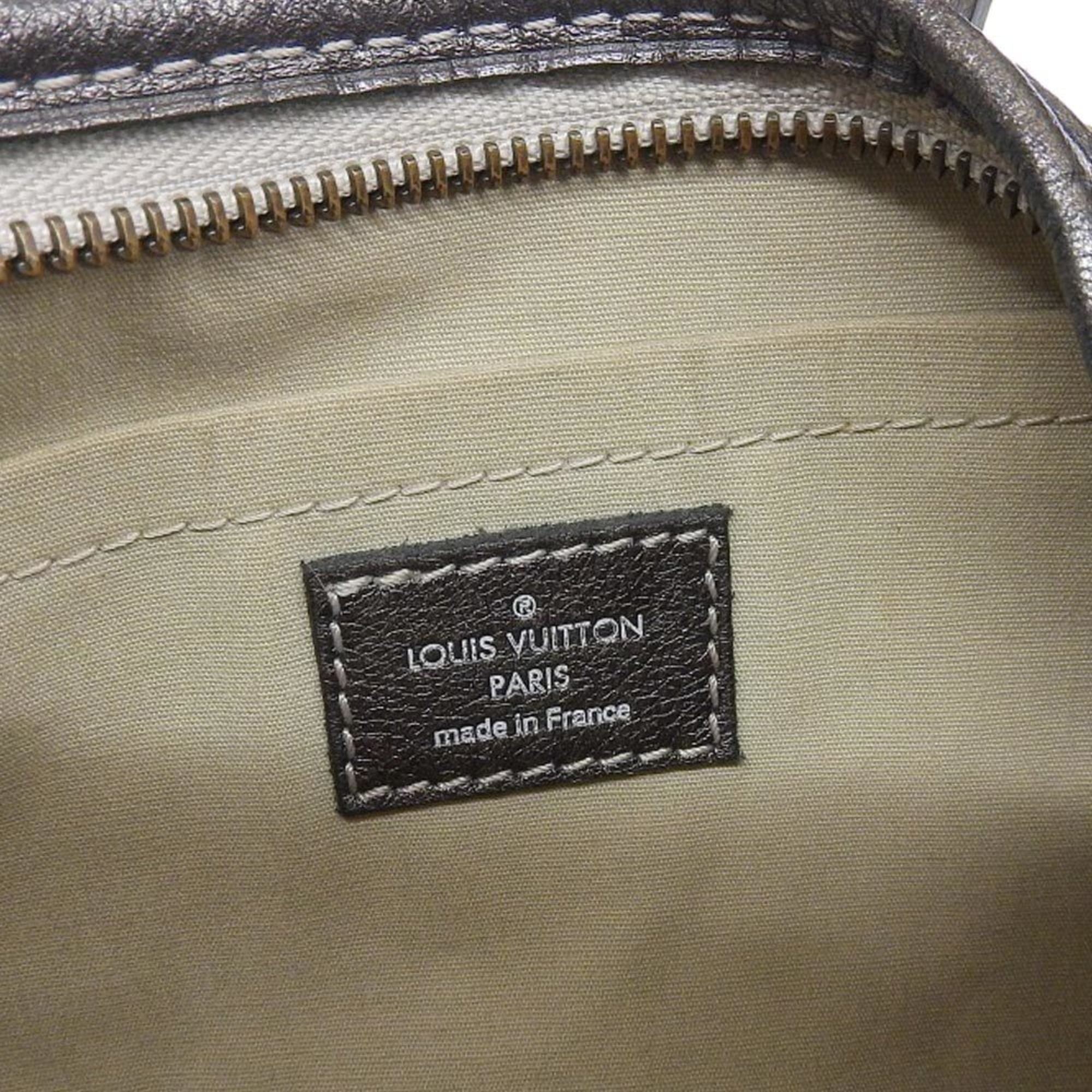 Elegant Grey Canvas Handbag with Iconic Design and Quality