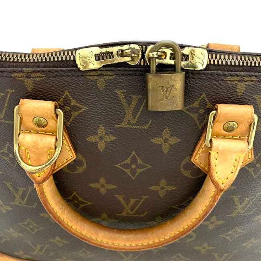Monogram Canvas Handbag with Leather Trim and Silver Metallic Finishes