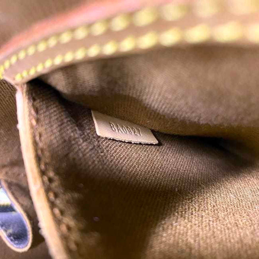 Monogram Canvas Handbag with Leather Trim and Silver Metallic Finishes