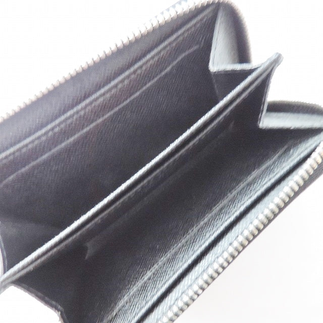 Louis Vuitton Porte Monnaie Zippy  Canvas Wallet  ()