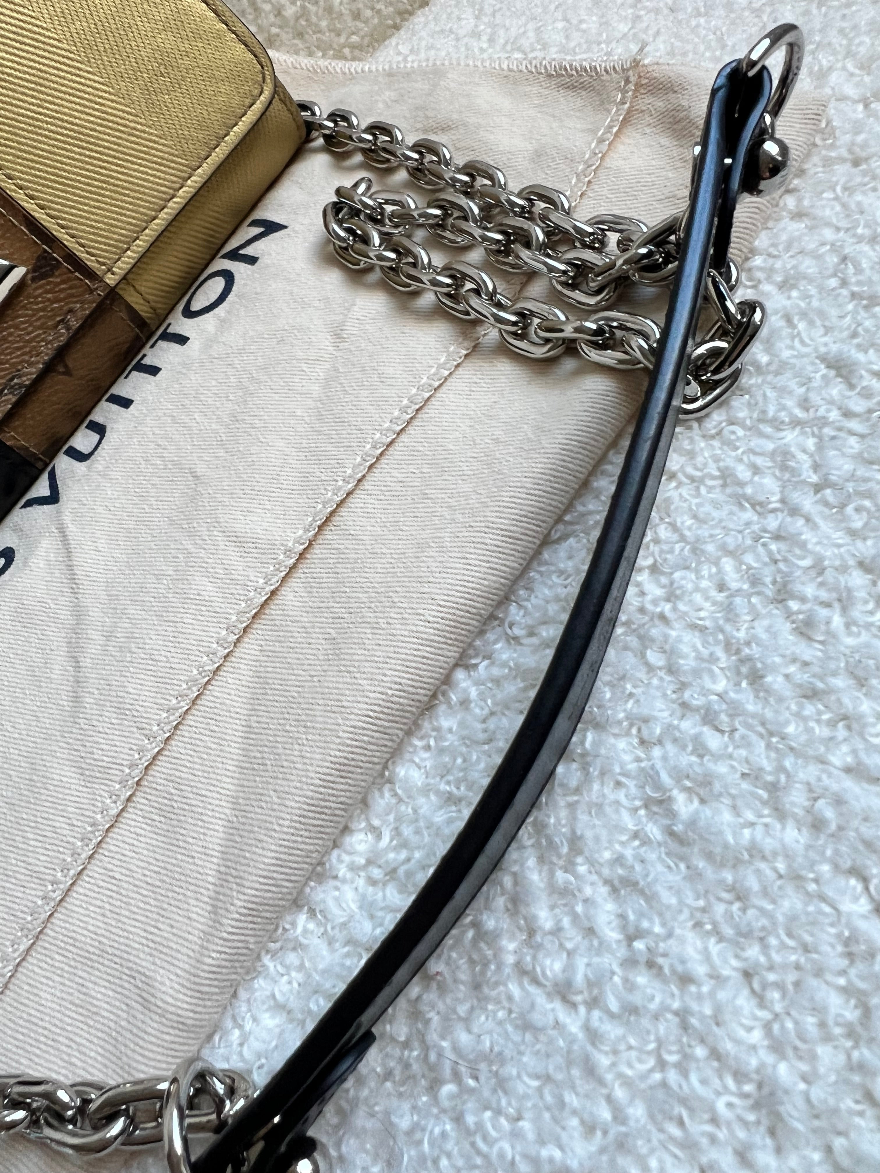 Louis Vuitton Reverse Monogram Studded Twist Chain Wallet
