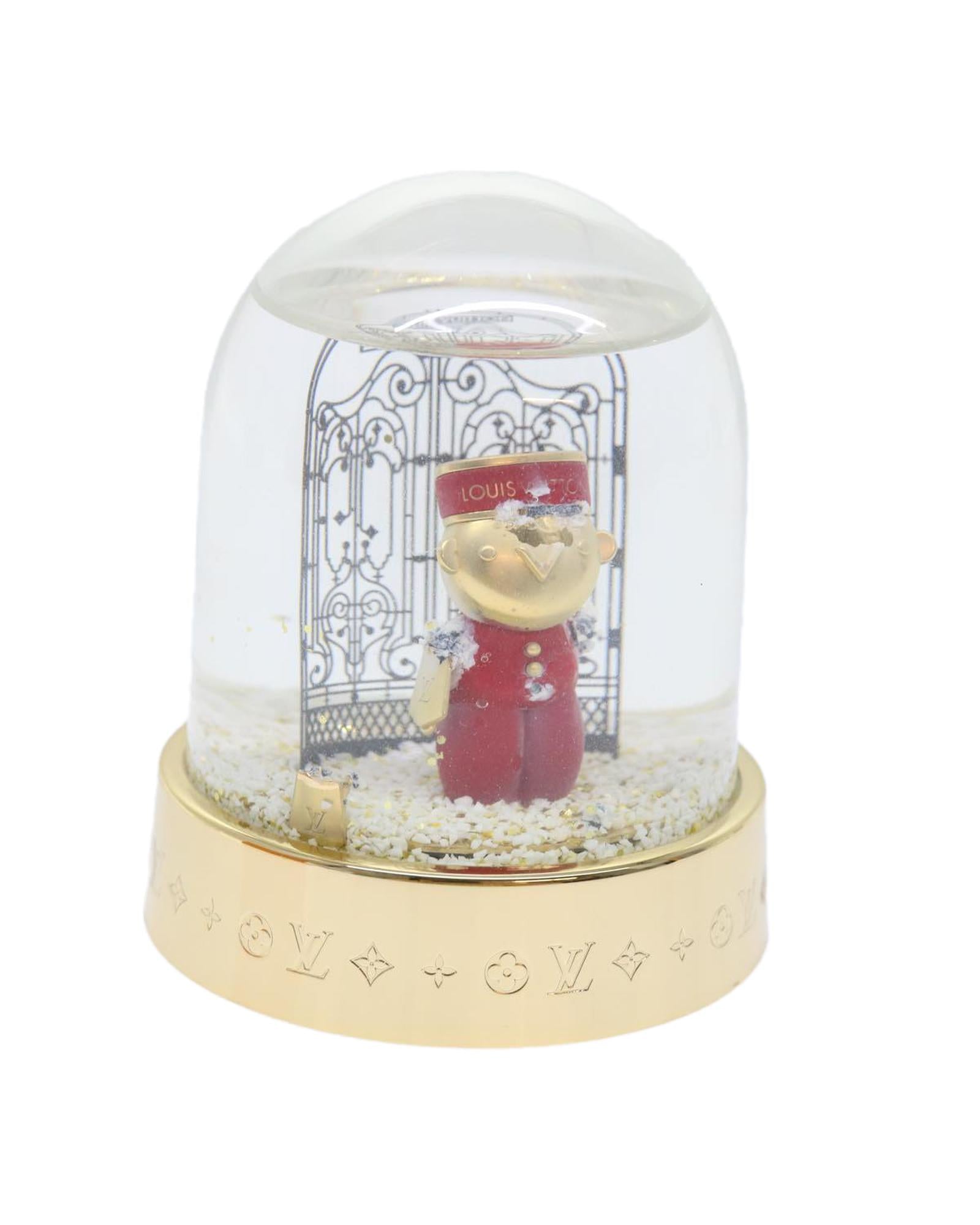 Clear and Gold Louis Vuitton Snow Globe