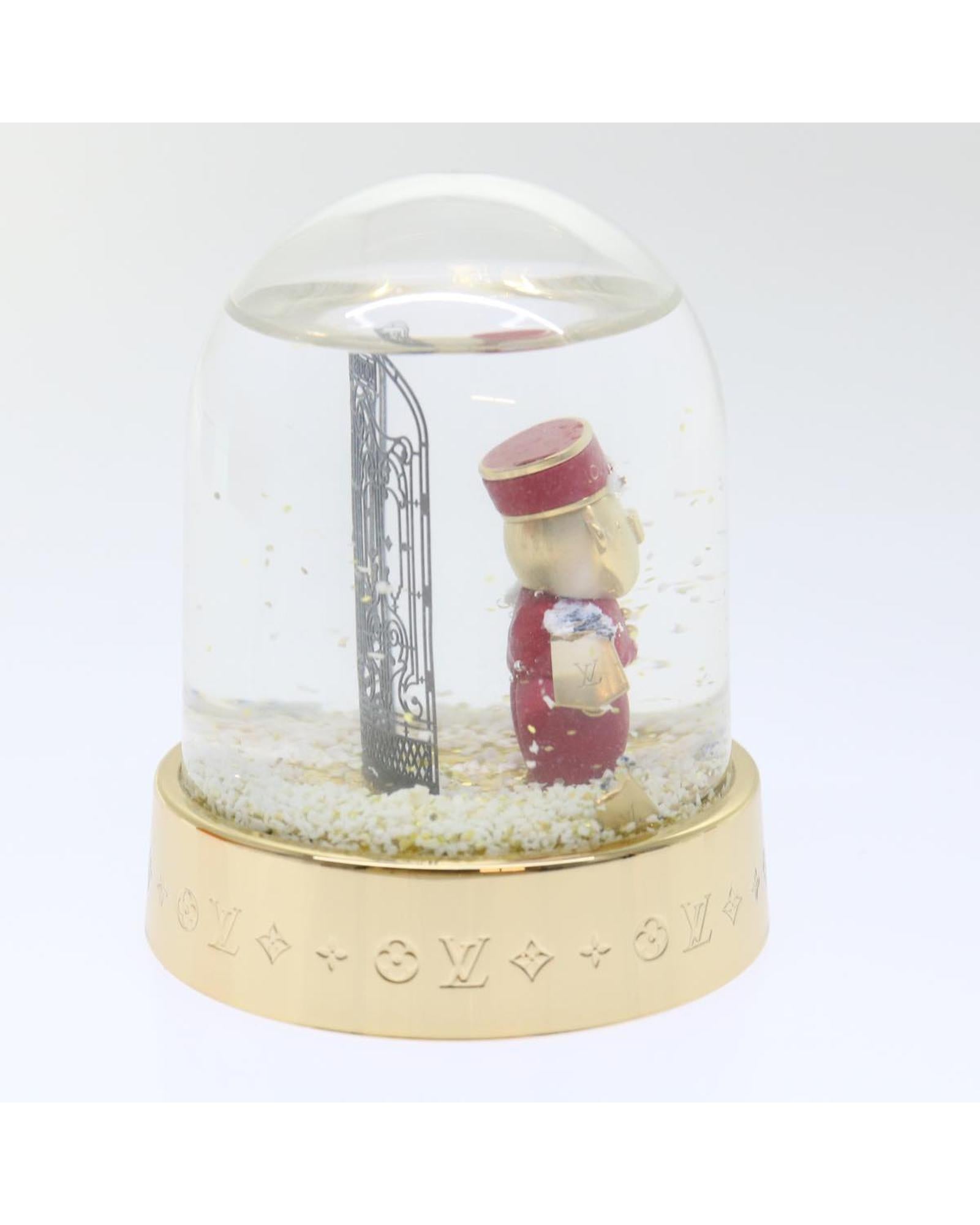 Clear and Gold Louis Vuitton Snow Globe