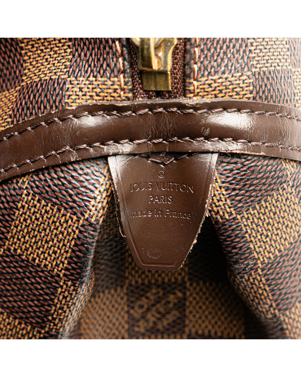 Damier Ebene Canvas Rivington PM with Leather Trim and Top Zip Closure