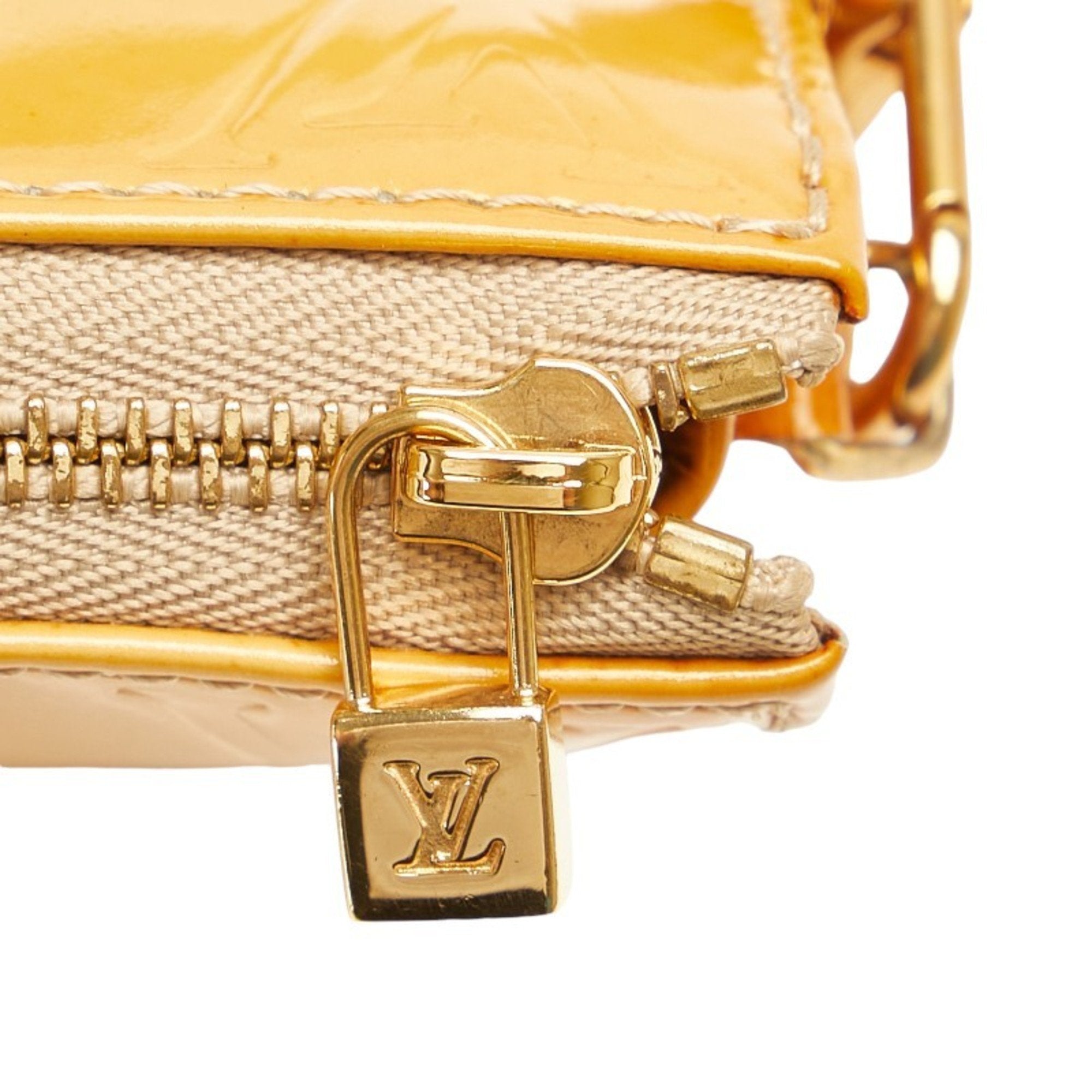 Pochette Flicie Monogram Vernis Clutch