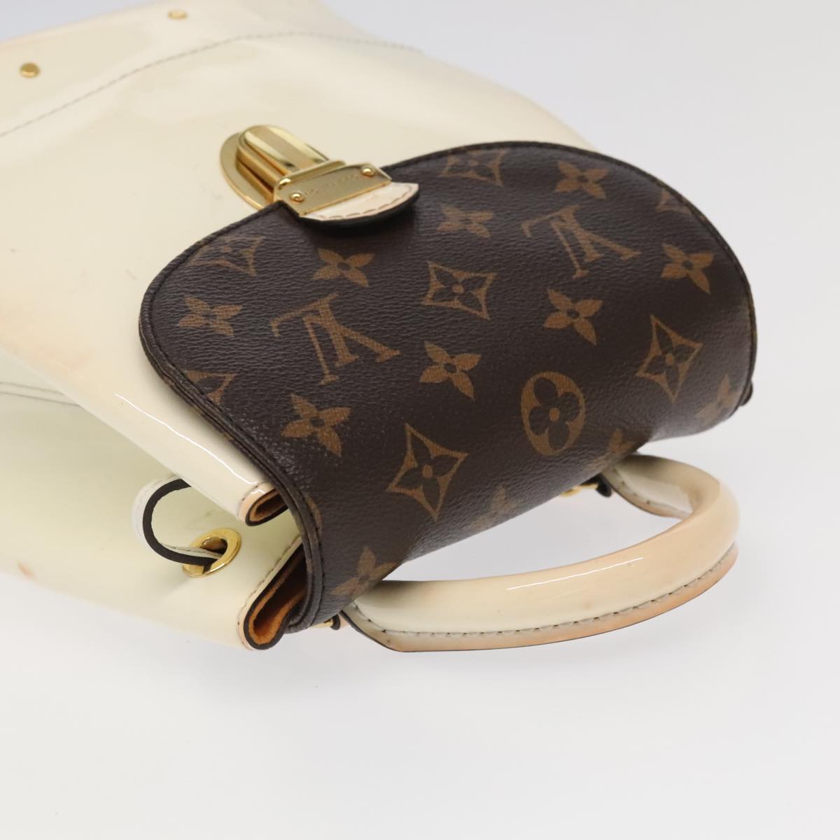 Mini Pochette Accessories Backpack