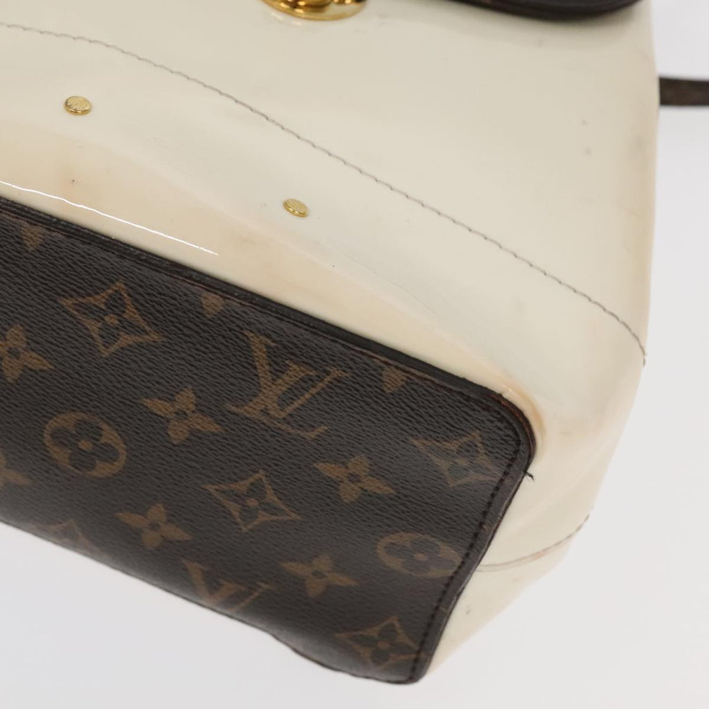 Mini Pochette Accessories Backpack