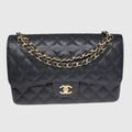 Black Jumbo Classic Caviar Double Flap Bag w/ GHW