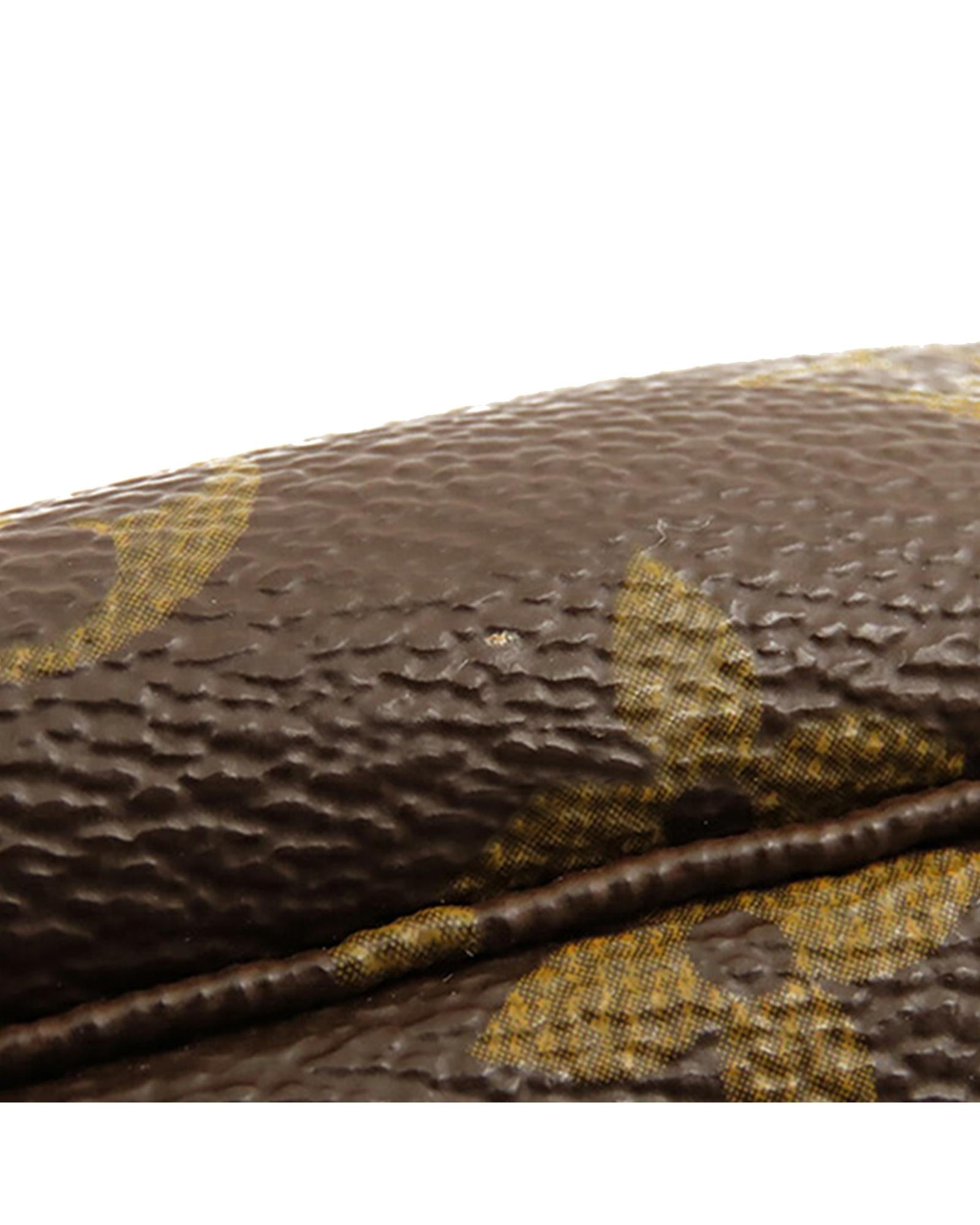 Monogram Canvas Pochette with Leather Strap and Zip Closure