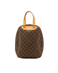 Monogram Canvas Excursion Bag with Vachetta Leather Trim and Zip Closure