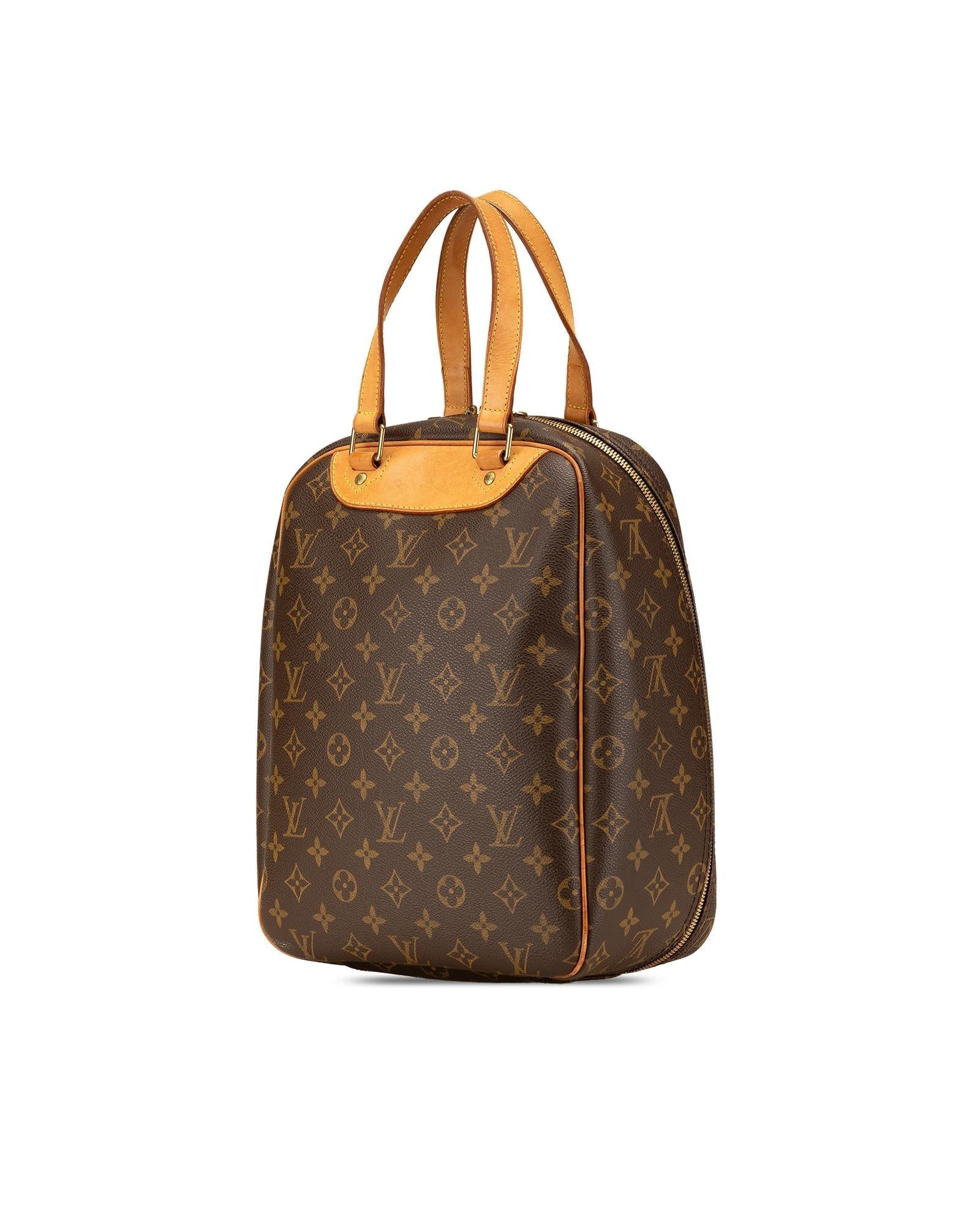 Monogram Canvas Excursion Bag with Vachetta Leather Trim and Zip Closure