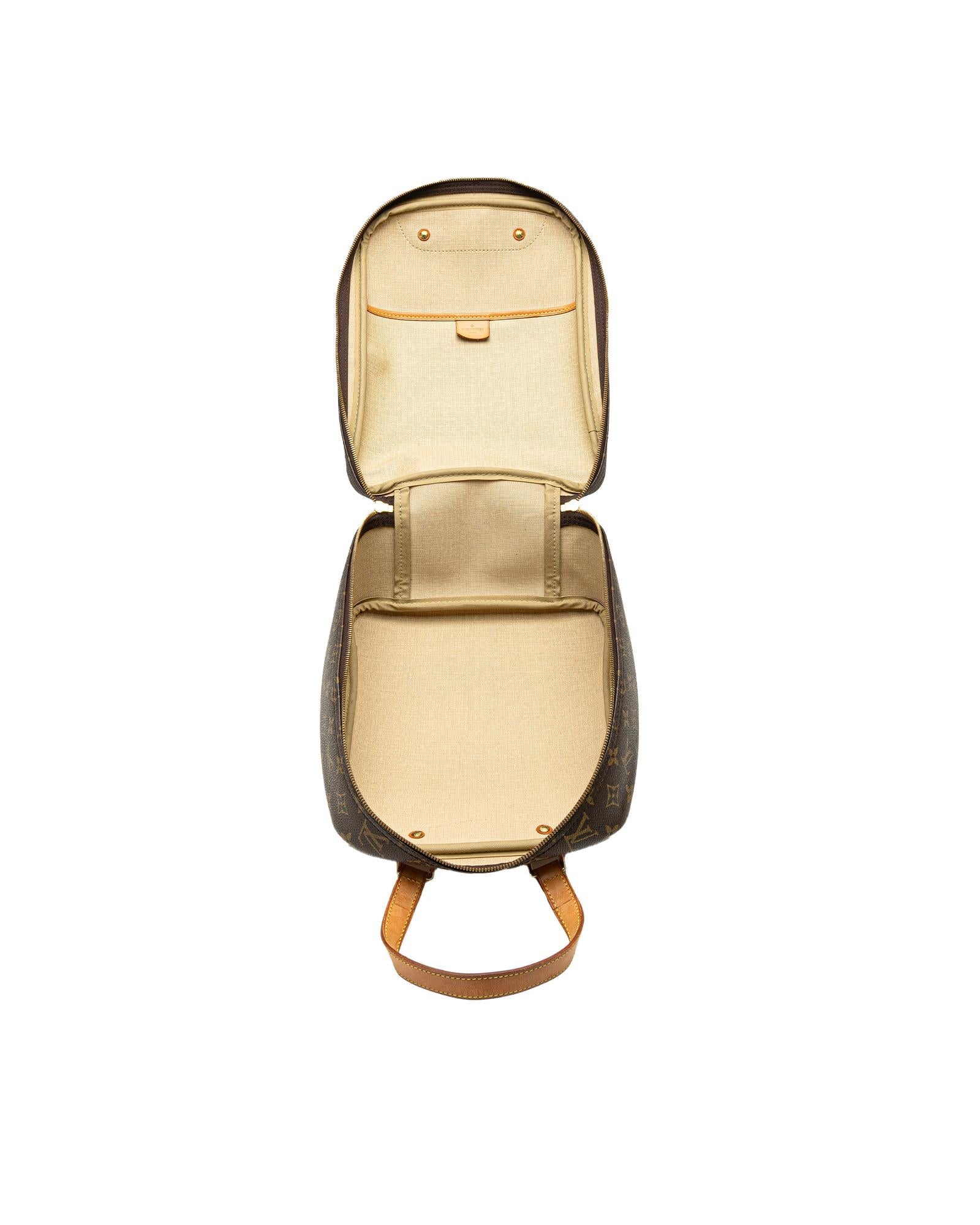 Monogram Canvas Excursion Bag with Vachetta Leather Trim and Zip Closure