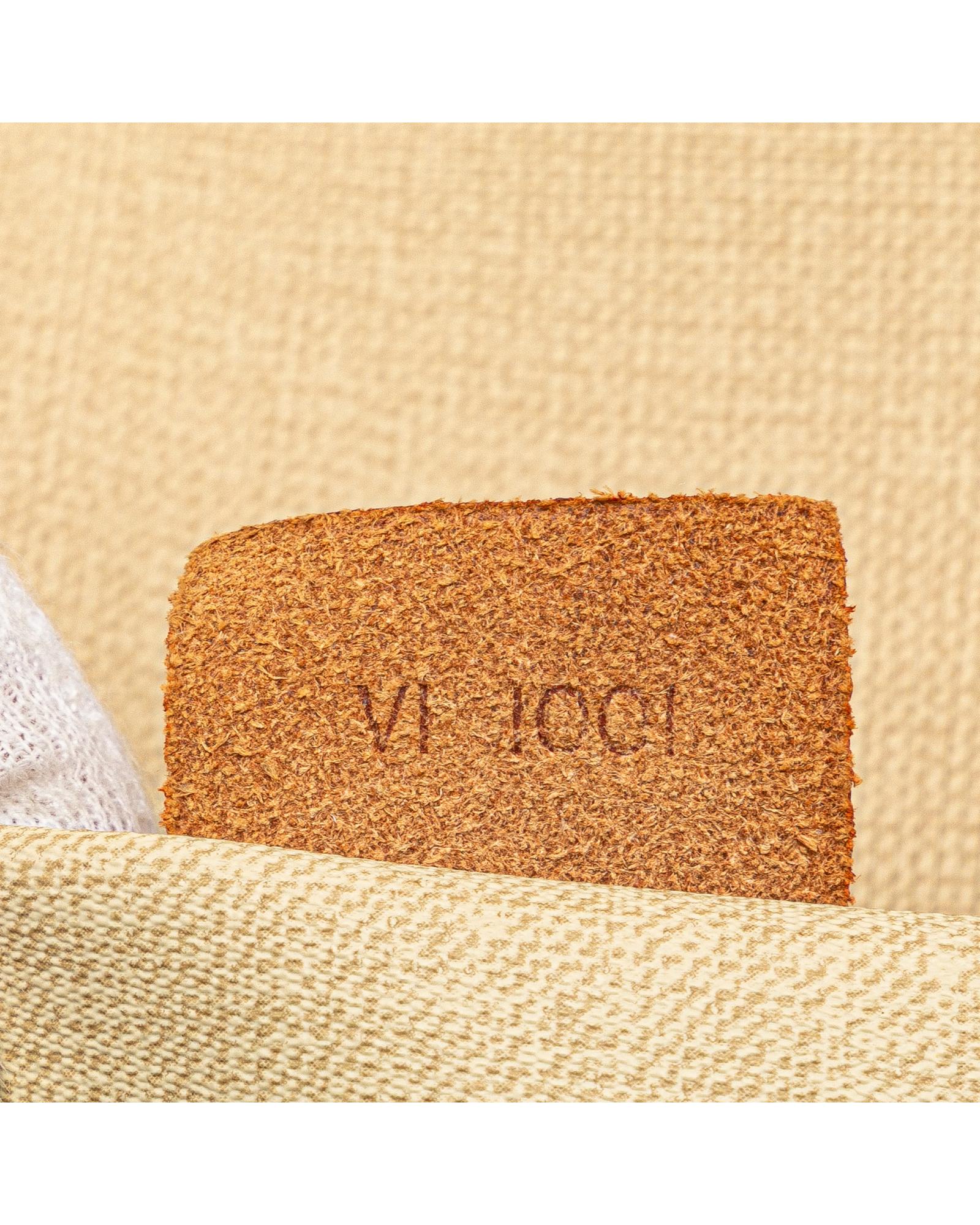Monogram Canvas Excursion Bag with Vachetta Leather Trim and Zip Closure