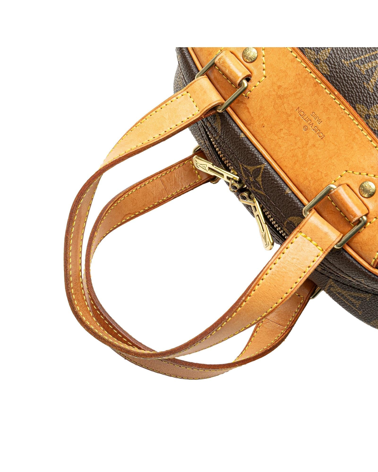 Monogram Canvas Excursion Bag with Vachetta Leather Trim and Zip Closure