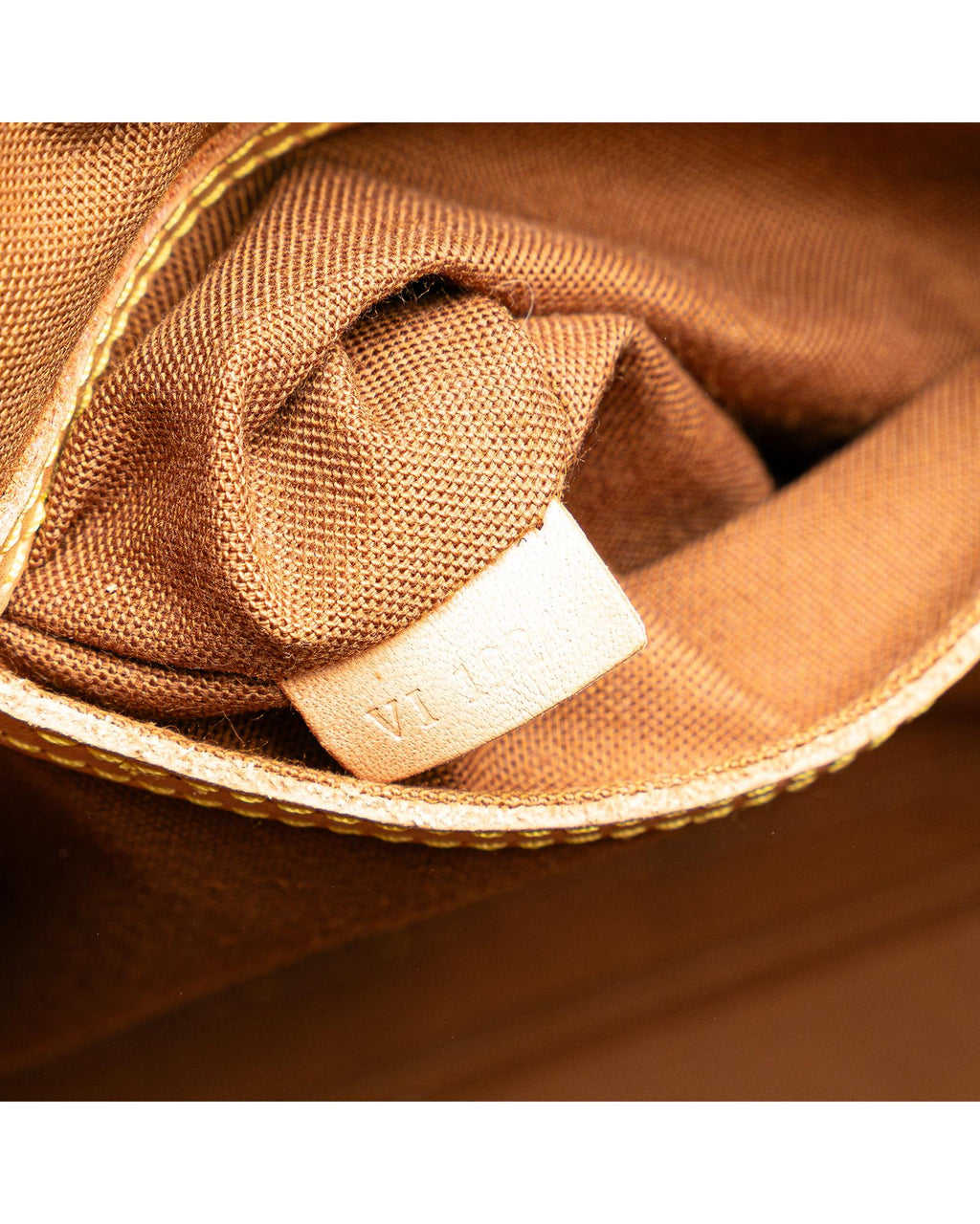 Monogram Canvas Alma PM with Vachetta Leather Trim and Top Zip Closure
