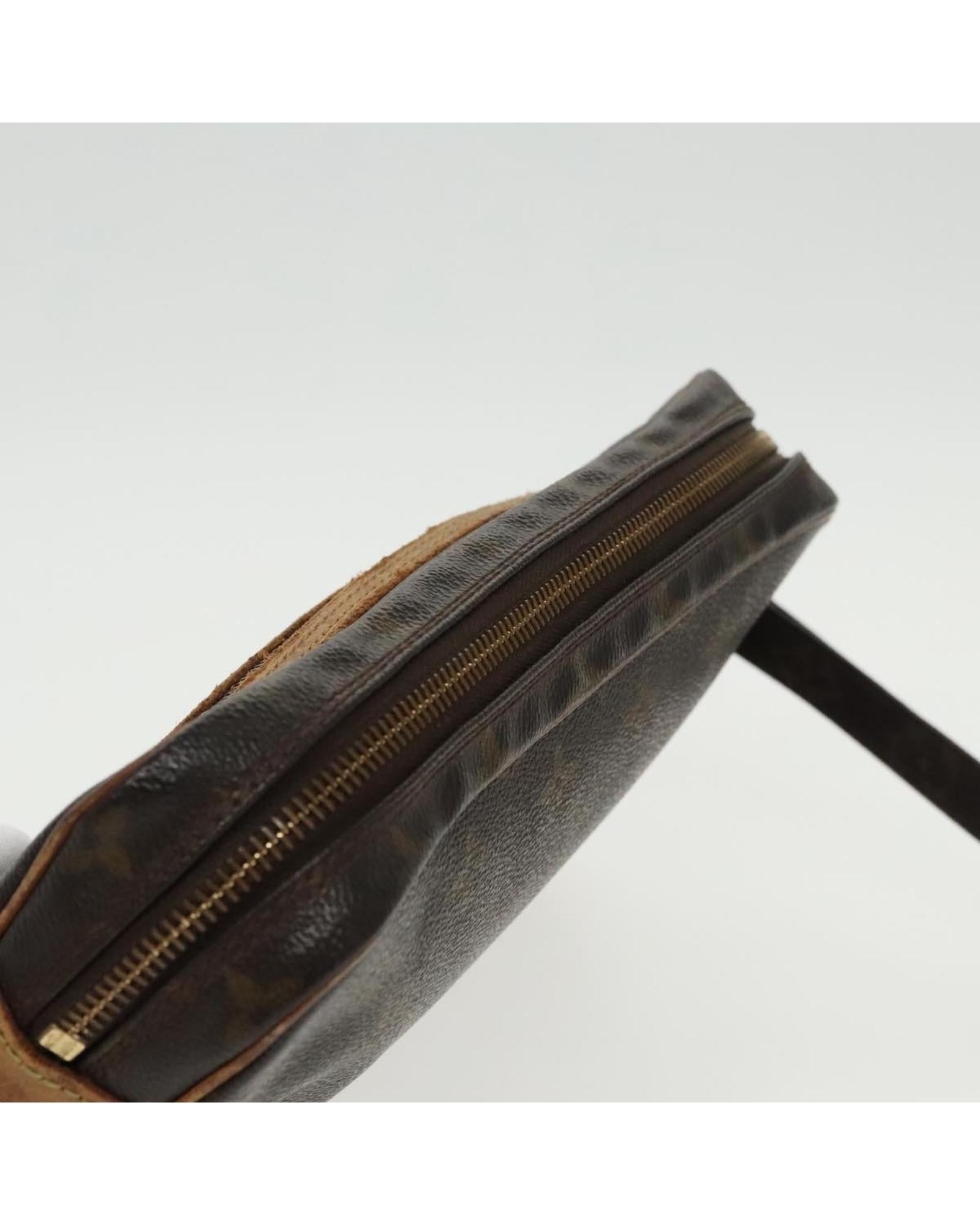 Pochette Monogram Canvas Clutch