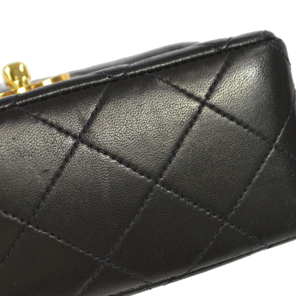 CHANEL 1994 Classic Flap Handbag Micro Black Lambskin 88126