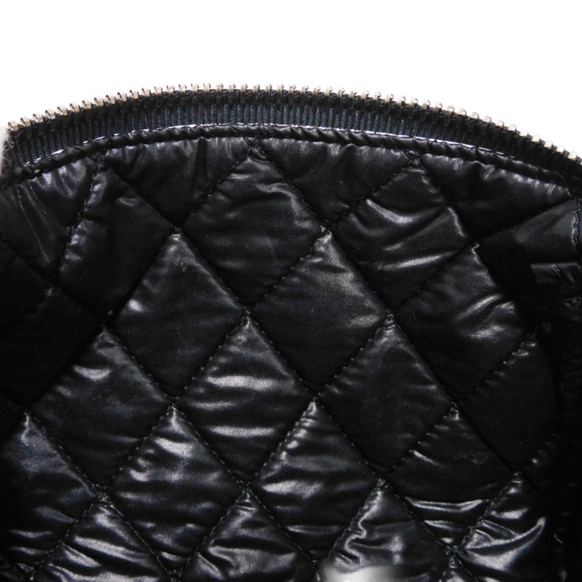 Chanel Camellia Synthetic Handbag with Metal Fittings
