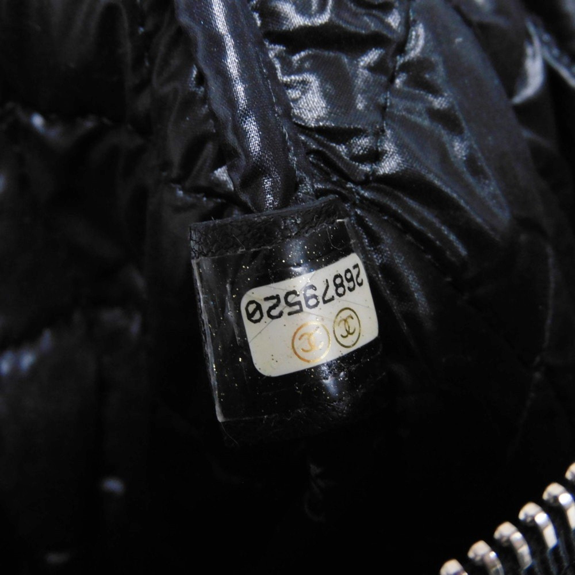 Chanel Camellia Synthetic Handbag with Metal Fittings