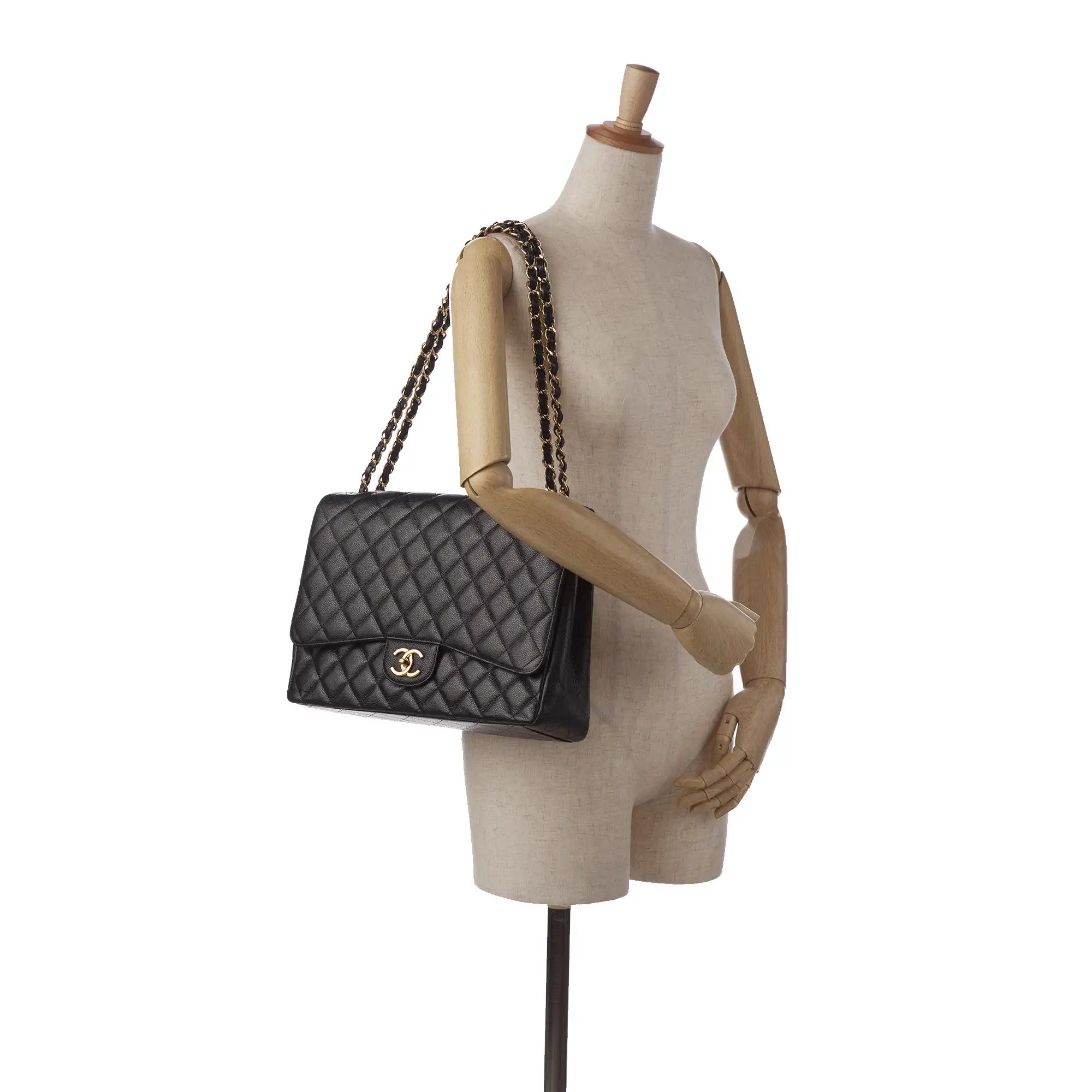 Chanel Classic Double Flap Maxi Black Caviar Gold