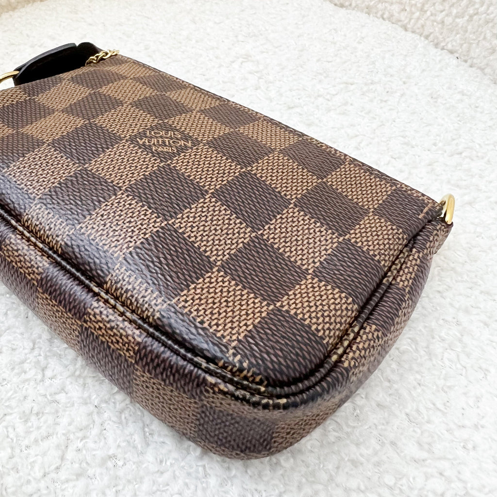 LV Mini Pochette Accessoires in Damier Ebene Canvas GHW