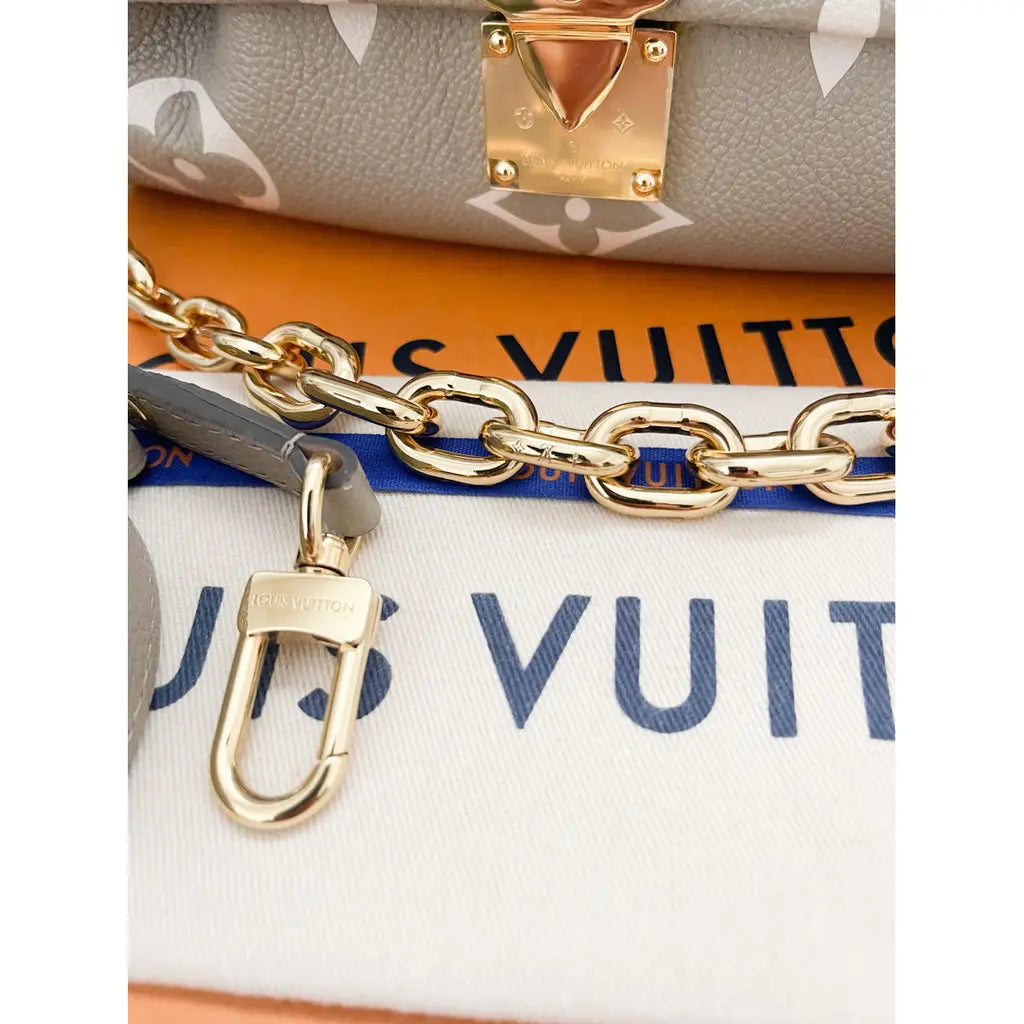 Louis Vuitton Favorite NM Handbag Bicolor Monogram Empreinte Giant