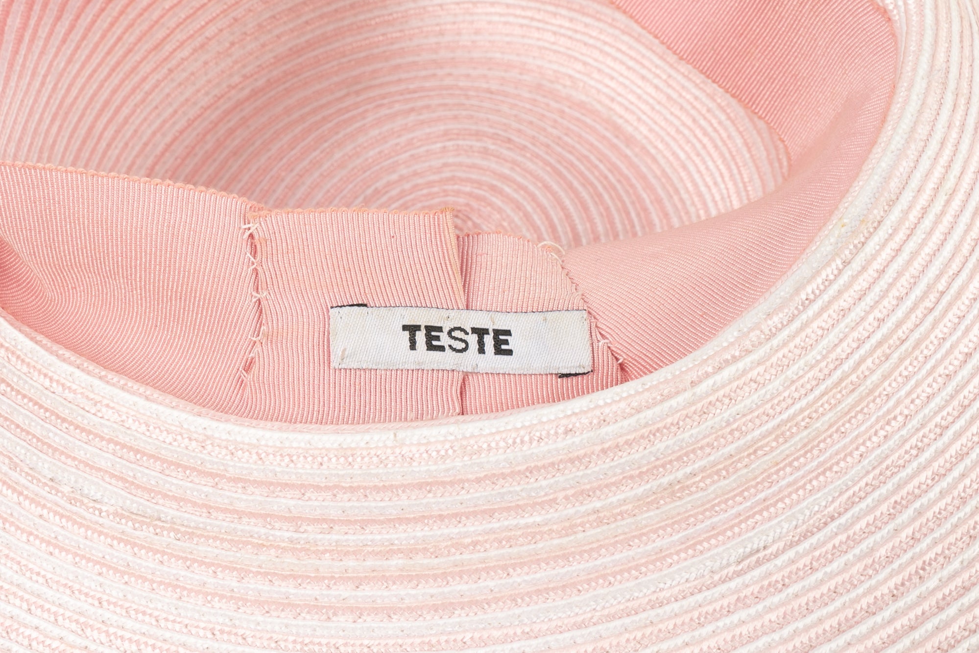 Capeline rose Teste