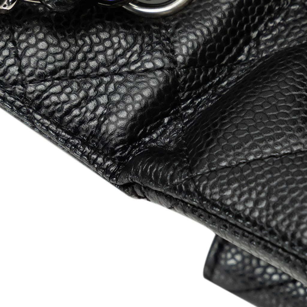 Chanel Classic Double Flap Maxi Black Caviar Gold