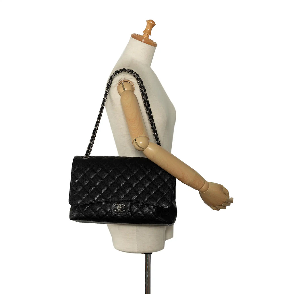 Chanel Classic Double Flap Maxi Black Caviar Gold